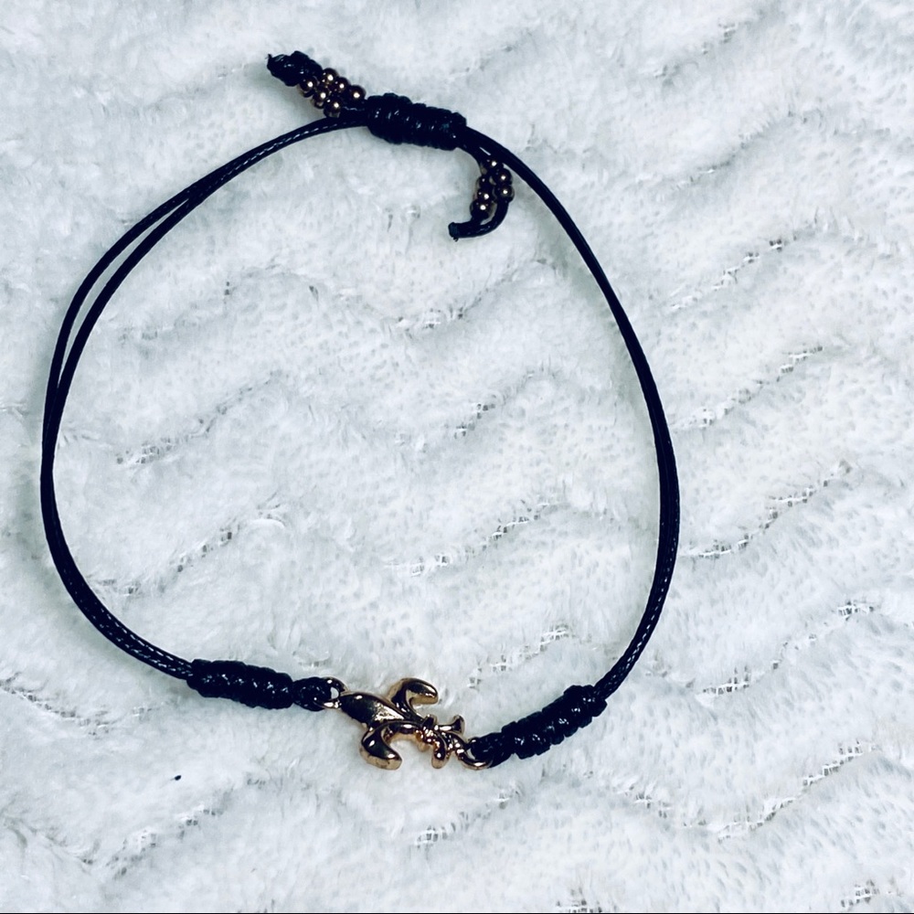 3/15🌻 Adjustable fleur de lis cord bracelet